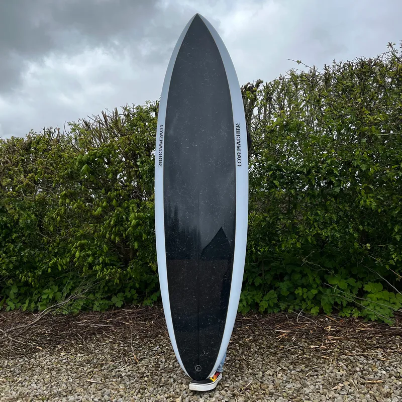 Love Machine Surfboards 6ft 6in FM Clear with Black Marble Gloss Deck  - Futures-1