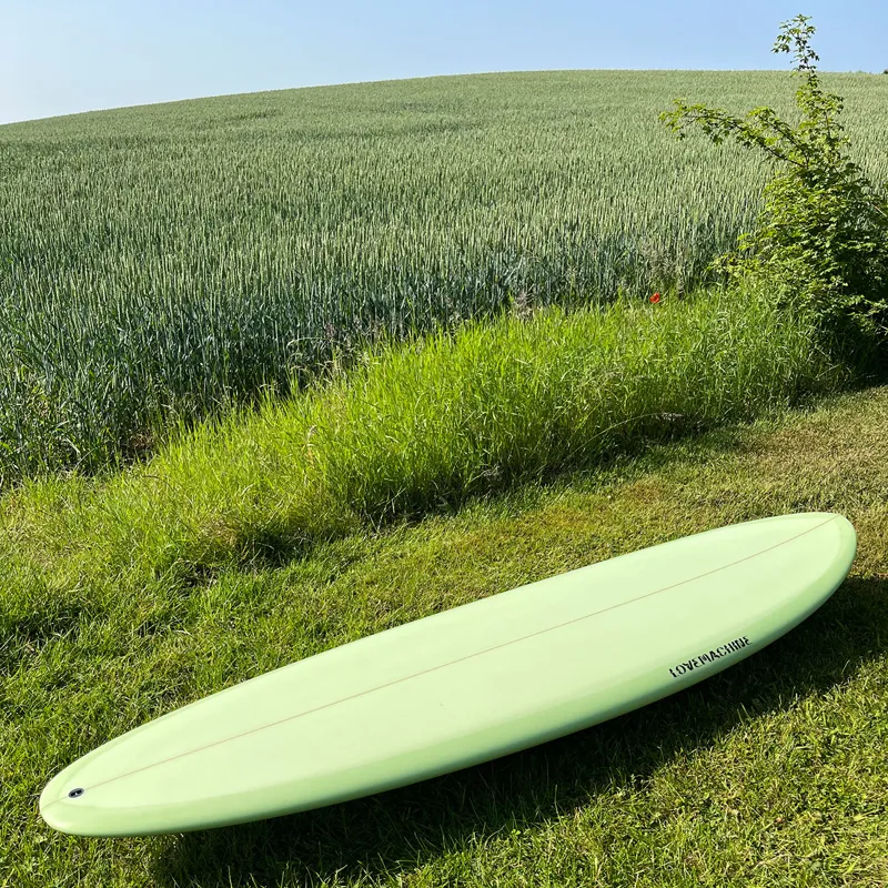 Love Machine Surfboards 6ft 10 Cheet in Green - Futures Sides-1