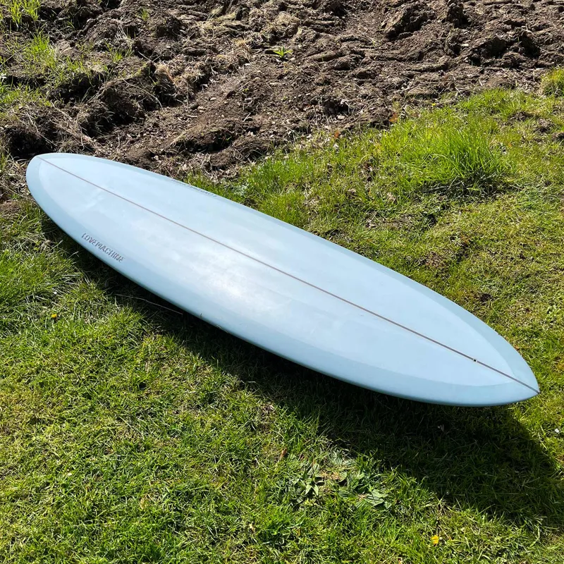 Love Machine Surfboards 7ft 4in Thick Lizzy in Blue - FCS Sides-2